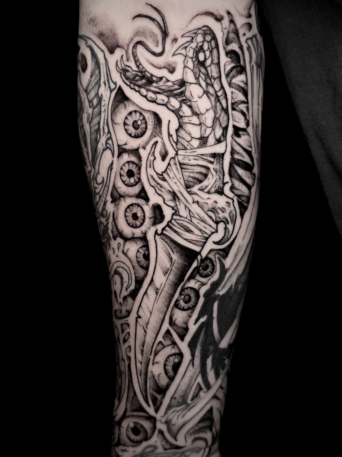 Bone creature tattoo