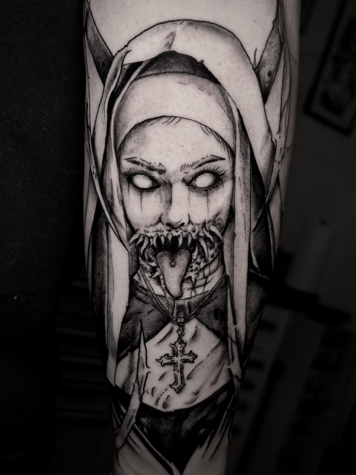 Dark figure tattoo